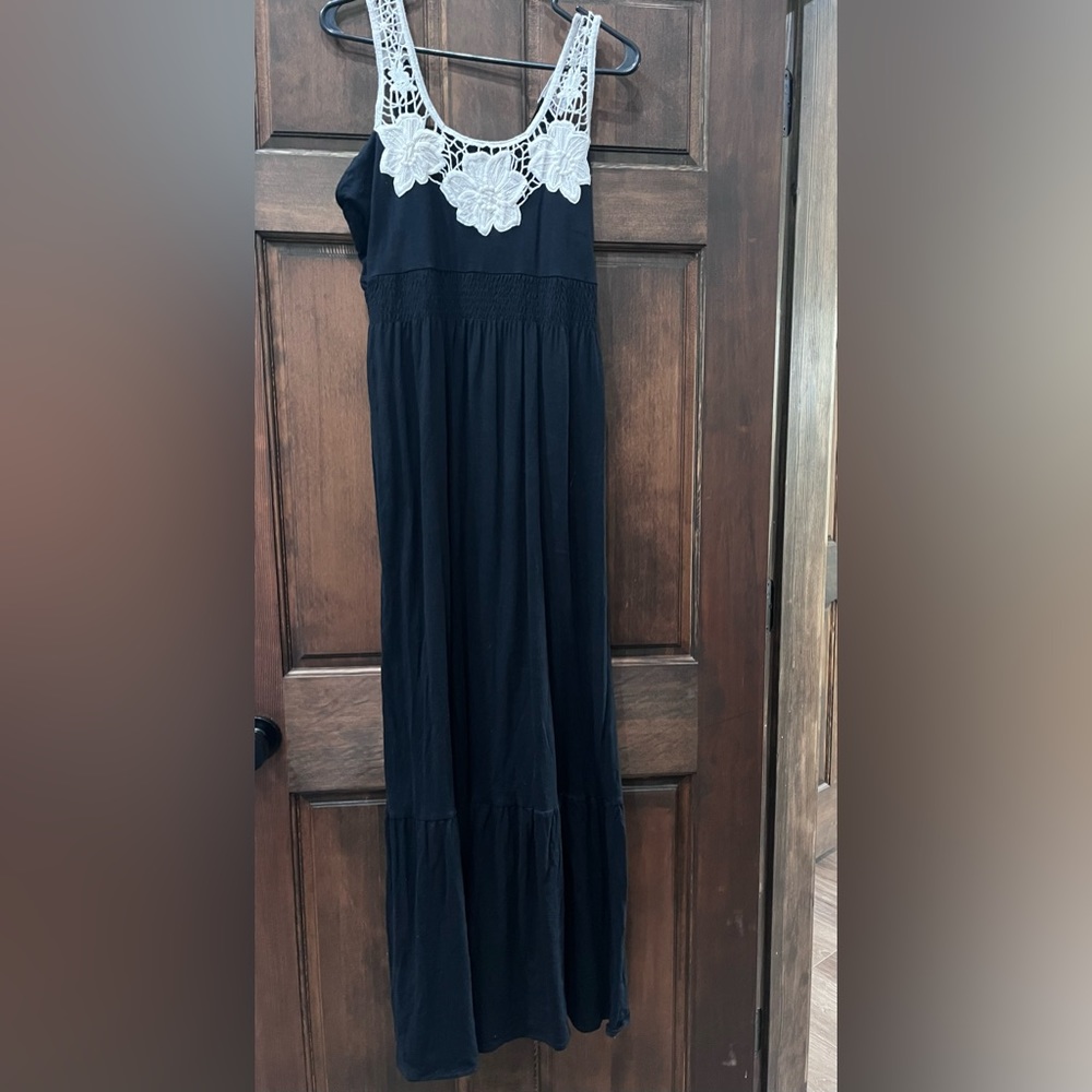 Black maxi dress with embroidered flowers